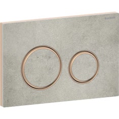Immagine di Geberit SIGMA50 placca di comando per risciacquo a due quantità, piastra base e anelli di design finitura oro rosso, placca di copertura e tasti finitura effetto cemento 115.650.JV.1