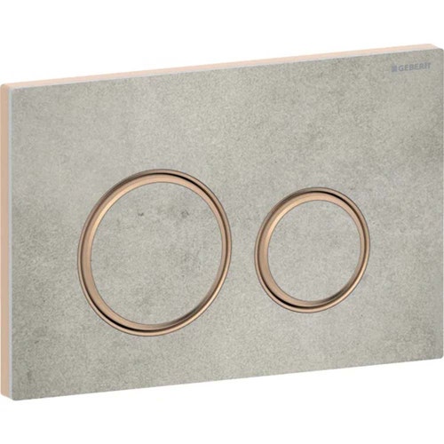 Immagine di Geberit SIGMA50 placca di comando per risciacquo a due quantità, piastra base e anelli di design finitura oro rosso, placca di copertura e tasti finitura effetto cemento 115.650.JV.1