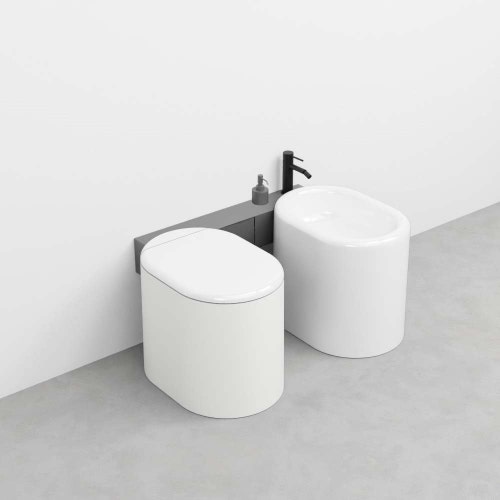 Immagine di Cielo ITACA mensola per wc e bidet in acciaio inox, con foro rubinetto, alloggio dispenser e portarotolo, versione destra, colore cemento finitura opaco ITMBWDXCM