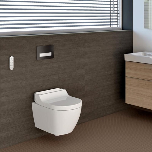 Immagine di Geberit AQUACLEAN TUMA COMFORT vaso sospeso, senza brida, completo di sedile con funzione bidet e chiusura ammortizzata, colore bianco 146.290.11.1