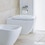 Immagine di Duravit HAPPY D.2 vaso sospeso Rimless®, a cacciata, senza brida e senza sedile, fabbisogno di acqua di risciacquo 4,5 l, UWL classe 1, WonderGliss, colore bianco 22220900001