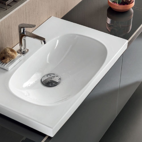 Immagine di Geberit ACANTO lavabo L.60 cm con foro rubinetteria, troppopieno nascosto e tappo per piletta, colore bianco finitura lucido 500.629.01.2