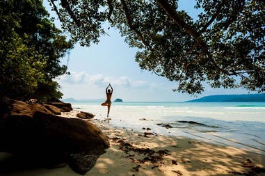 Session of yoga on the sea in Cambodia