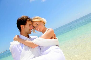 Honeymoon couple on the beach