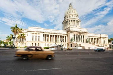 Capitolio and vintage car in Havana in front of the Capitolio of Cuba