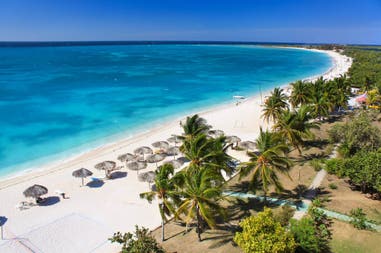 White sandy beach and crystal-clear sea in Cuba