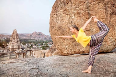 india-virupaksha-temple-woman-doing-yoga