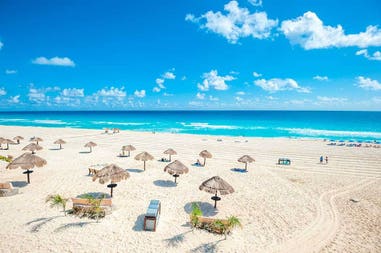 Crystal-clear sea and white sandy beach in Playa del Carmen in Mexico