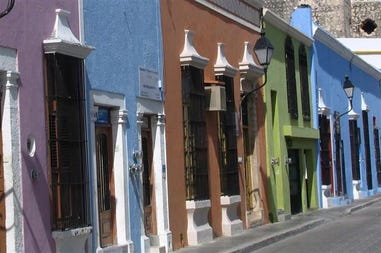 Typical colourful houses in a street of Campeche in Mexico