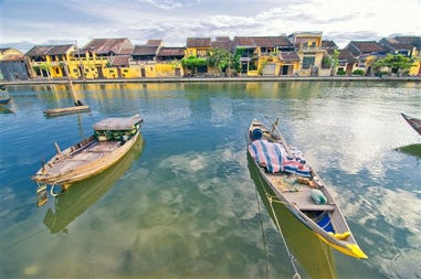 Traditional boats on Hoai river in Vietnam