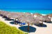 Umbrellas on a white sandy beach in Cuba