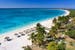 White sandy beach and crystal-clear sea in Cuba