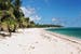 Crystal-clear sea and white sandy beach in Guadeloupe