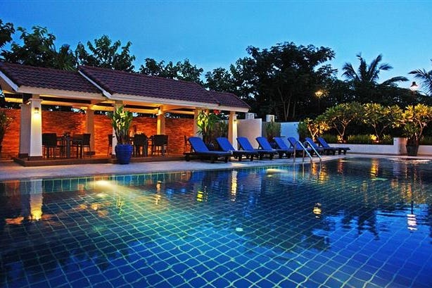 Outside swimming pool at night v