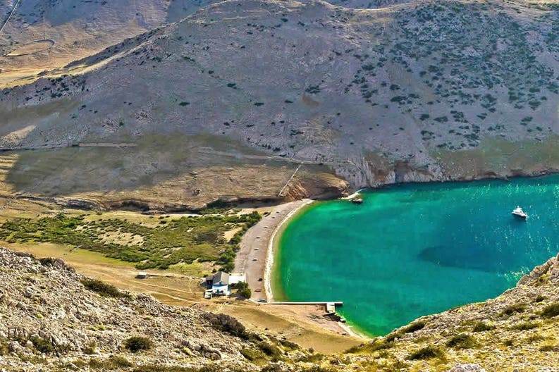 croatia-island-of-krk-green-and-blue-yachting-bay-mala-luka-lagoon-in-stone-desert