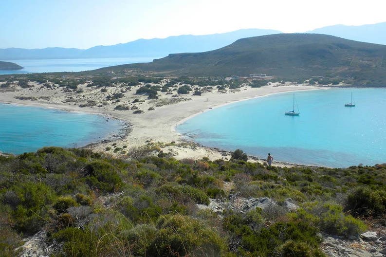 View of the crystal-clear sea and the lush vegetation in Greece