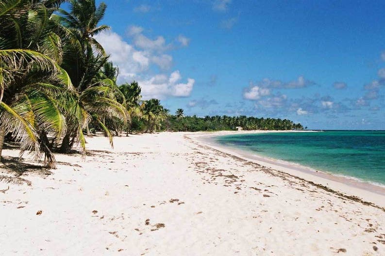Crystal-clear sea and white sandy beach in Guadeloupe