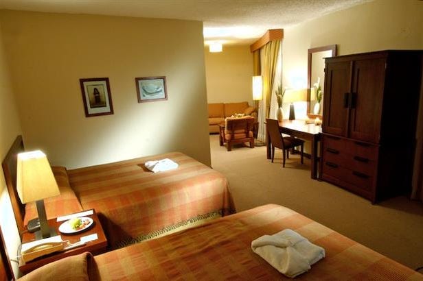 Bedroom of Porta Hotel del Lago in Guatemala