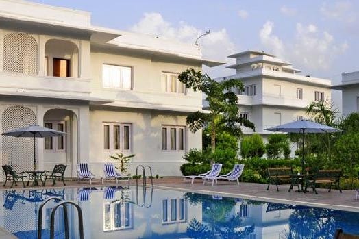 Swimming pool of the Udai Vilas Palace Hotel in Bharatpur in India