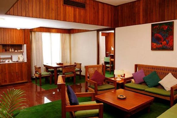 Soggiorno di una camera privata del Casino Hotel a Cochin in India