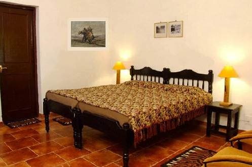 Bedroom of The Krishna Jungle Lodge in Kanha National Park in India