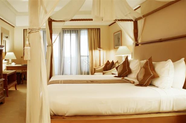 Bedroom of the Melia Purosani in Jogjakarta in Indonesia