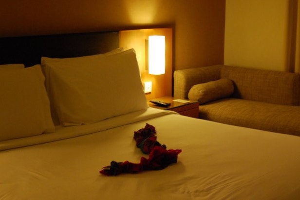 Bedroom of Santika Surabaya in Indonesia