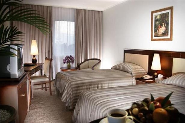 Bedroom of the Mercure Royal Regency Hotel in Ujung Pandang in Indonesia