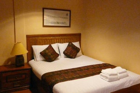 Camera da letto del Pakse Hotel nel Laos
