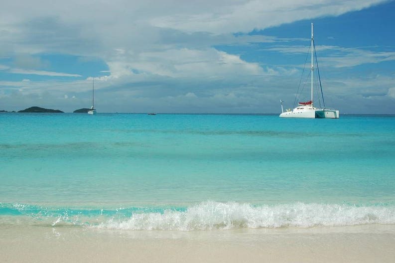 Sailing boat over the sea of Tobago Cays in the Caribbean