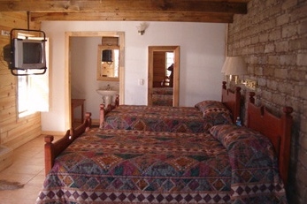 Camera da letto del Best Western The Lodge at Creel in Messico