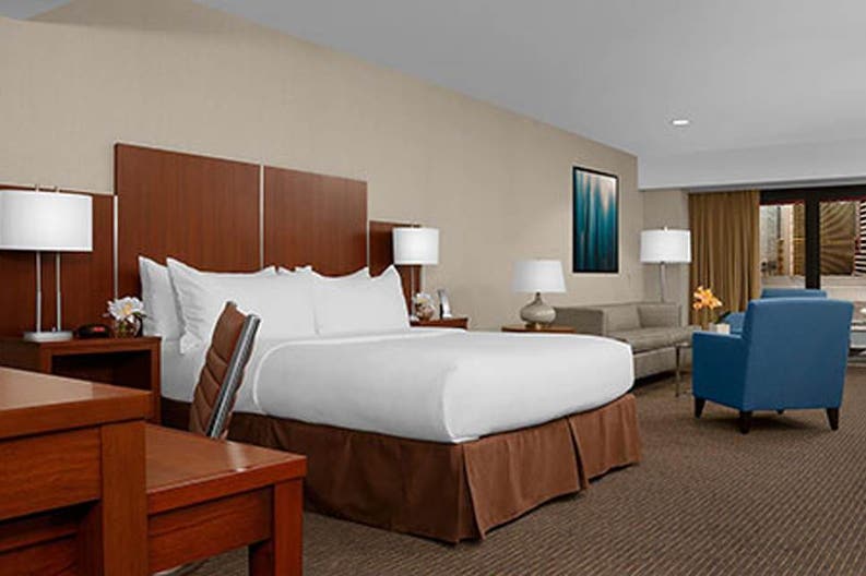 Bedroom of the hotel The Manhattan at Time Square in New York in the United States of America