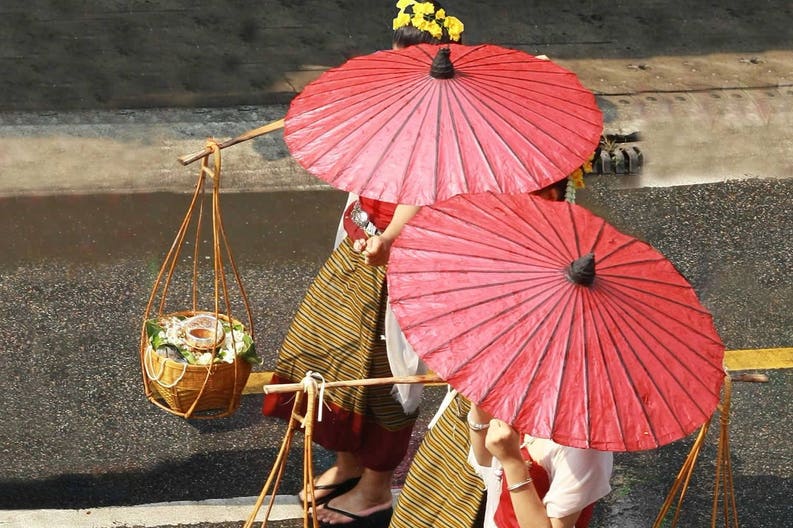 Women waling on road in Thailand